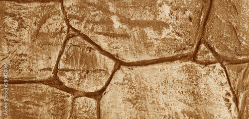 Rock brick wall tiling mechanism background. Nature. Photo
