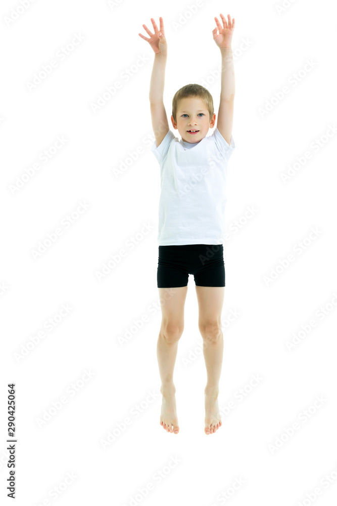 A little boy in a clean white T-shirt is jumping fun. A little boy in a clean white T-shirt is jumping fun.
