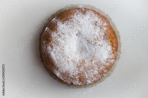 Sponge cake in the center of a white background. Baking on a white background. Sponge cake on a white background.