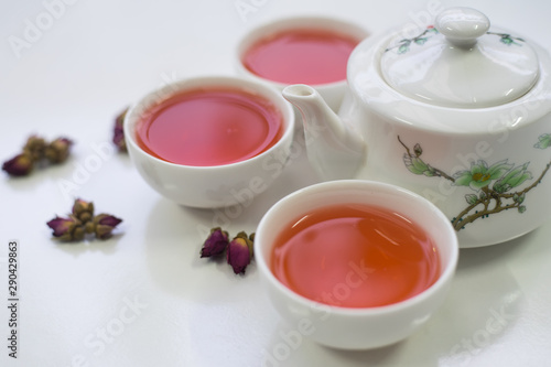 Rose tea on a white background