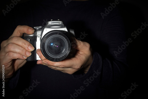 Hands with a camera