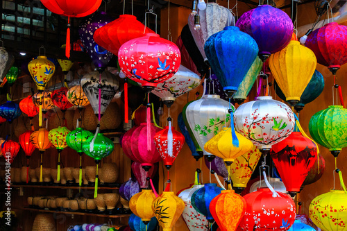 Traditional Vietnamese lamps are popular souvenir in Hoi An. Lanterns at street market in mid-autumn festival  many lanterns hanging on street.