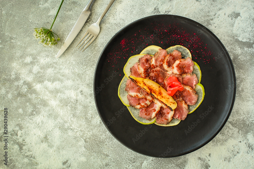 meat duck and pear, carpaccio (savory snack, gourmet cuisine) menu concept. food background. copy space. Top view