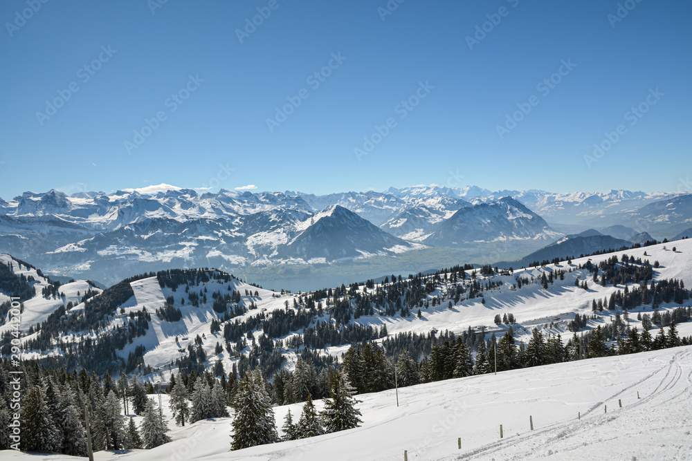 Beautiful view on snowy Swiss Alps from top of Mount Rigi in canton of Schwyz in Switzerland
