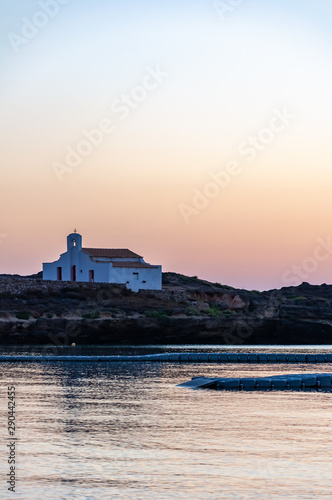Zakynthos Island, Greece. A pearl of the Mediterranean with beaches and coasts suitable for unforgettable sea holidays. church on the sea in Agios Nikolaos Beach at sunrise.