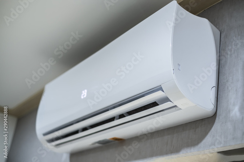 Inverter Air conditioner install on modern grey wall