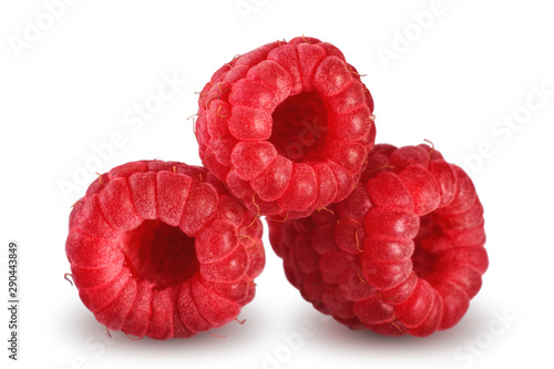 Raspberry isolated. Three sweet red ripe raspberry berries isolated on white background, close-up, clipping path