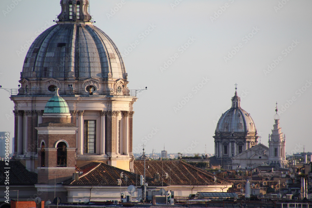 Naklejka premium View of the rooftops of Rome at sunset