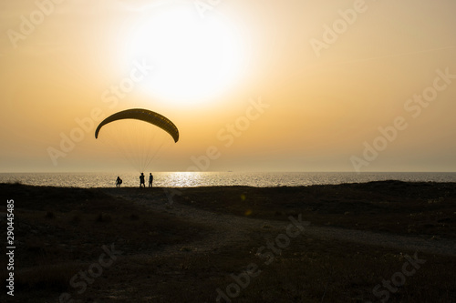 Kitesurfing lessons at sunset in San Giovanni Sinis, Cabras, Oristano - West coast of Sardinia © Salvatore