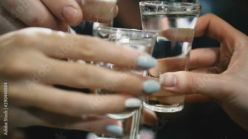 Alcohol. Glasses with alcohol. People drink alcohol.