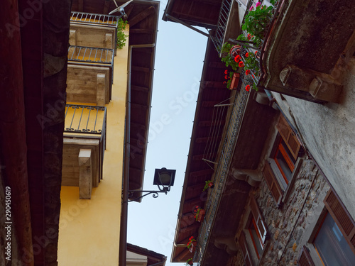 old wooden door on the wall of an italian house