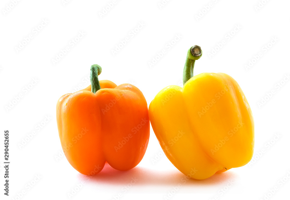 Fresh orange and yellow bell pepper isolated on white background Fresh orange and yellow bell pepper isolated on white background