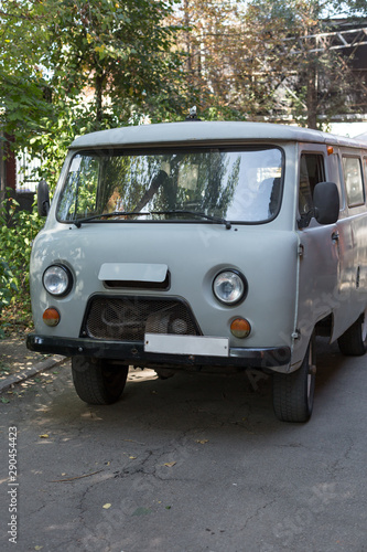 Old cargo van. Grey retro car. © jonnyslav