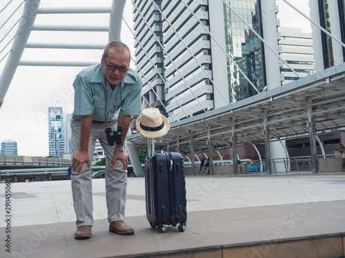 elderly man resting after walking around town