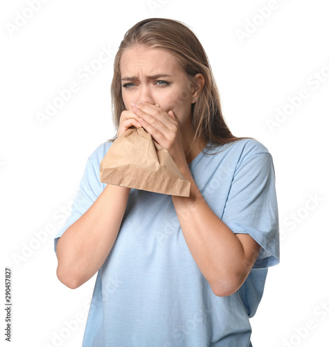 Woman with paper bag having...