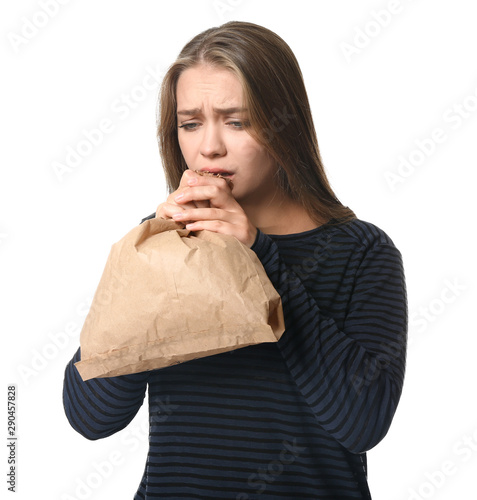 Woman with paper bag having...