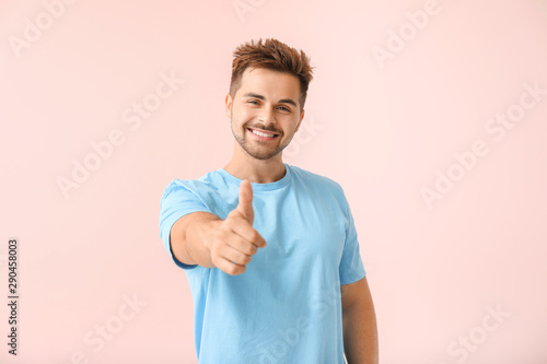 Portrait of happy young man...