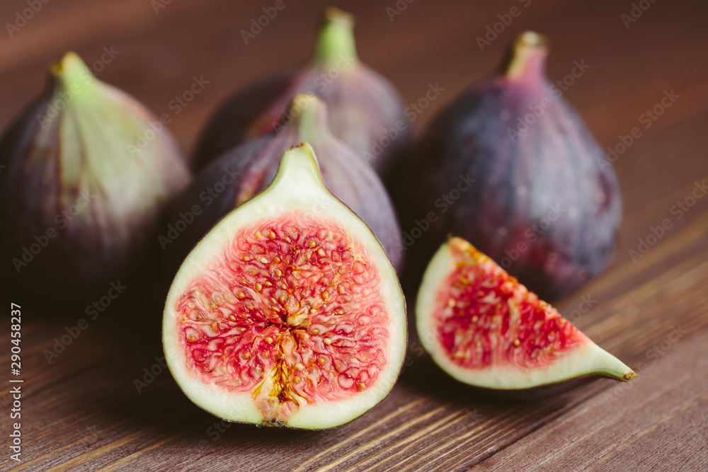 fresh fig fruits on dark wooden background fresh fig fruits on dark wooden background