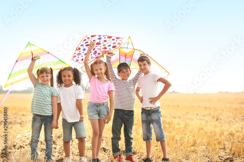 Little children flying kite...