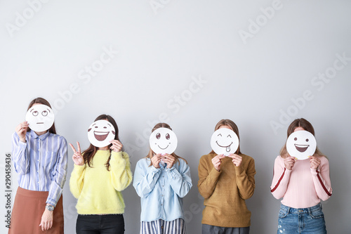Group of woman covering the...