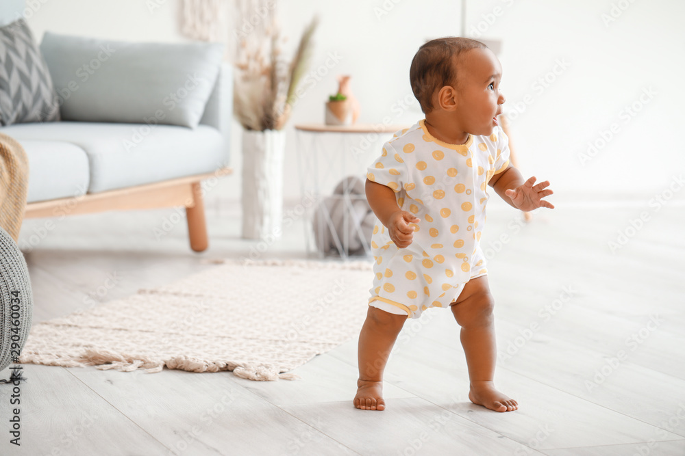 Cute little baby learning to walk at home Cute little baby learning to walk at home