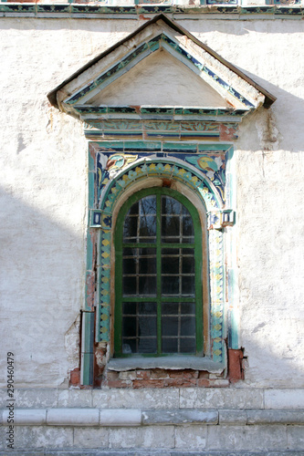 Photo of a window on an old white stone house © Valentina