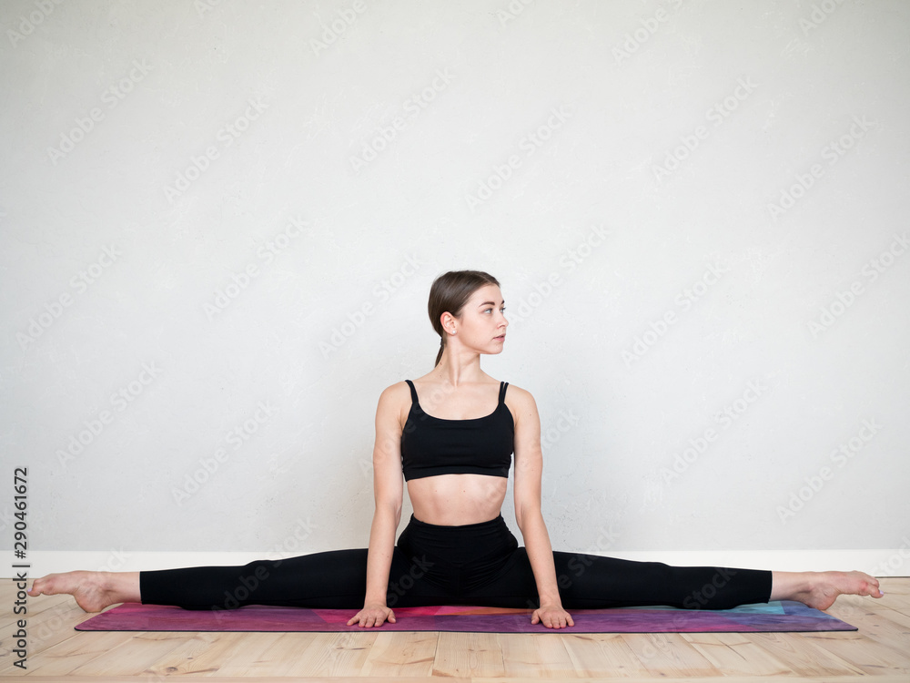 Attractive european girl doing yoga exercise Attractive european girl doing yoga exercise