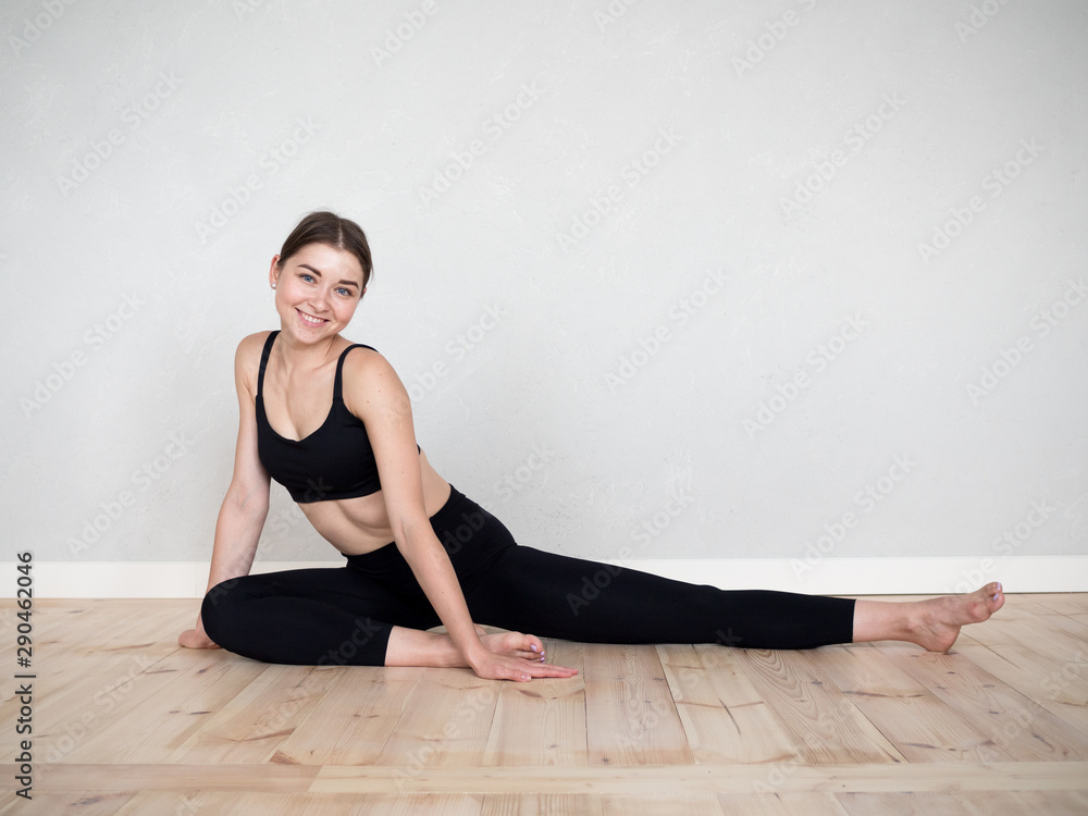 Attractive european girl doing yoga exercise Attractive european girl doing yoga exercise