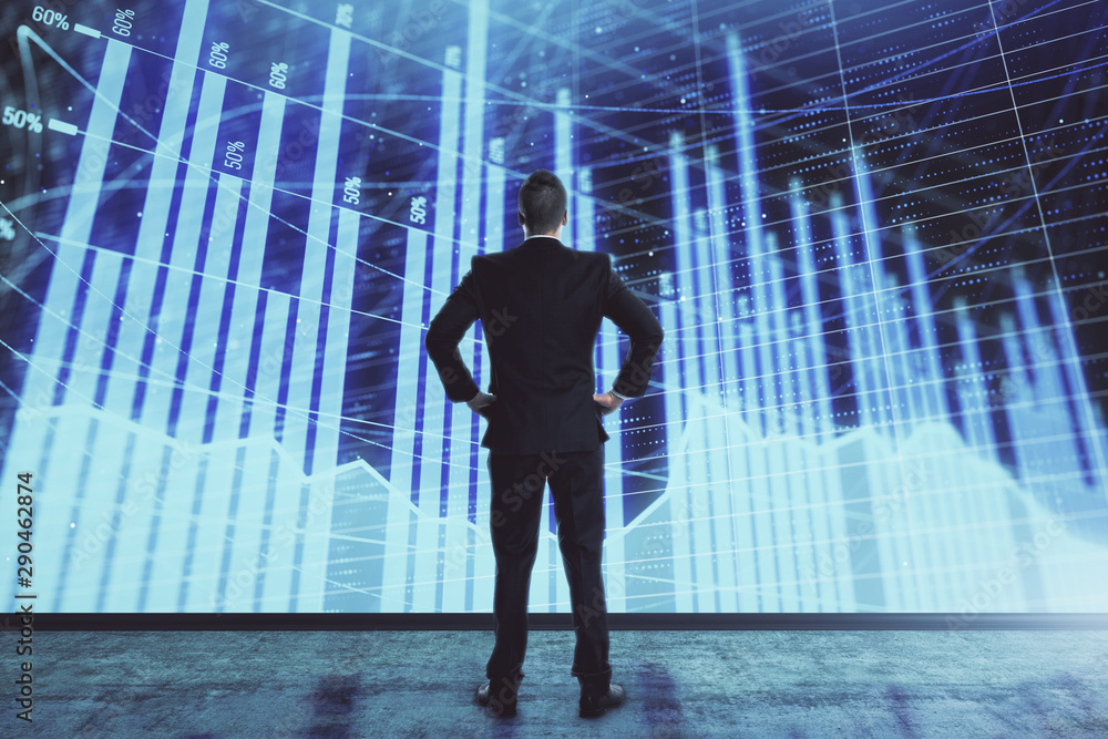 Businessman and forex graph hologram. Double exposure. Concept of financial education and analysis Businessman and forex graph hologram. Double exposure. Concept of financial education and analysis