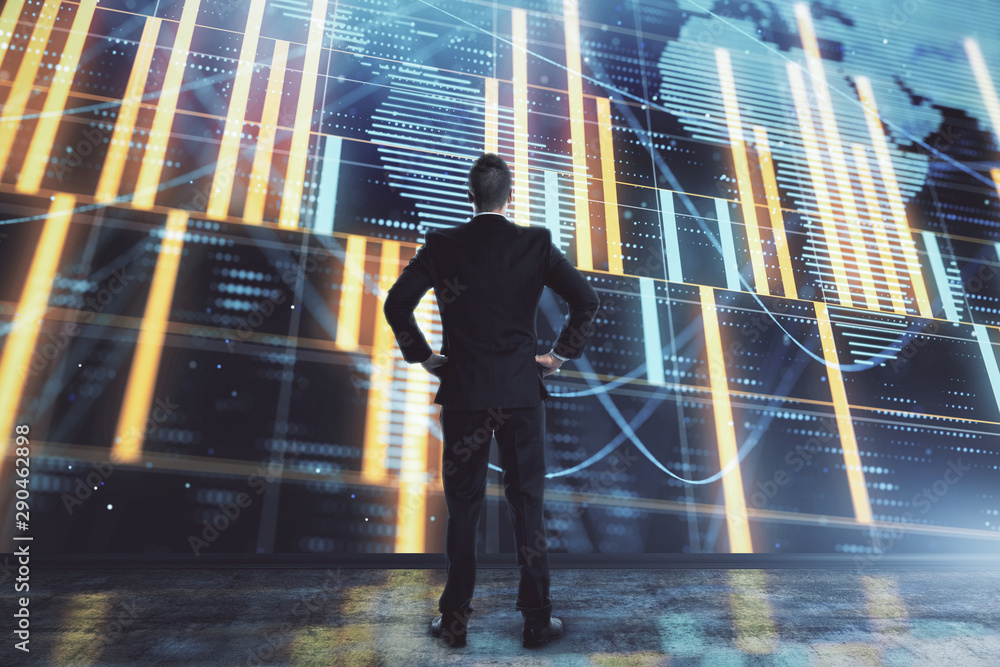 Obraz premium Businessman and forex graph and world map hologram. Double exposure. Concept of financial education and analysis