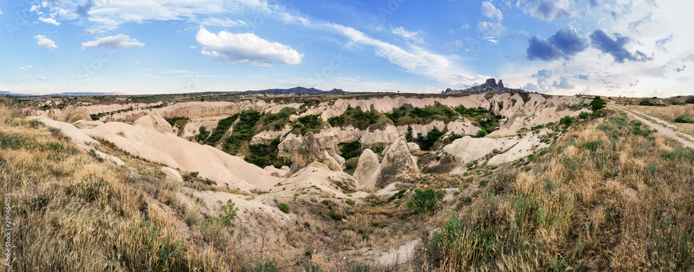 Sandy volcanic cliffs of Cappadocia in summer