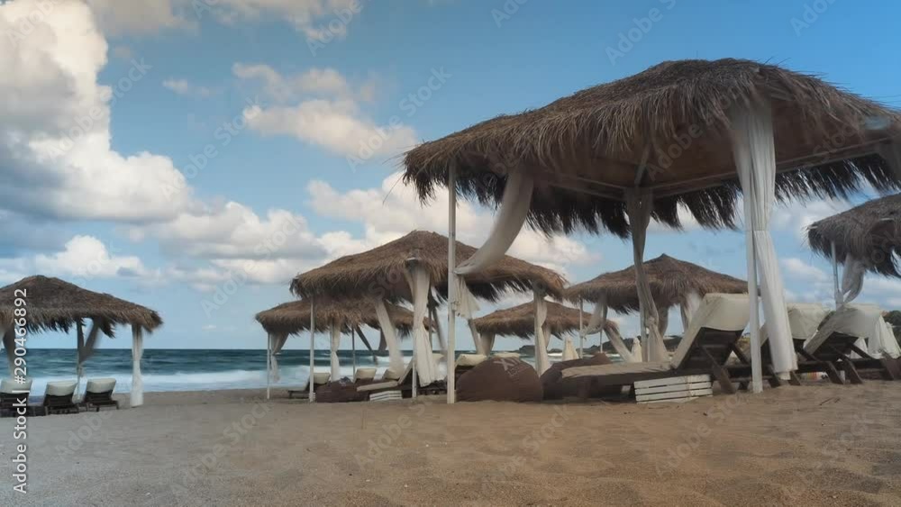 Beautiful Beach Tent Setup, Resort Destination. Beach with canopies, umbrellas and sun beds. Beautiful Beach Tent Setup, Resort Destination. Beach with canopies, umbrellas and sun beds.