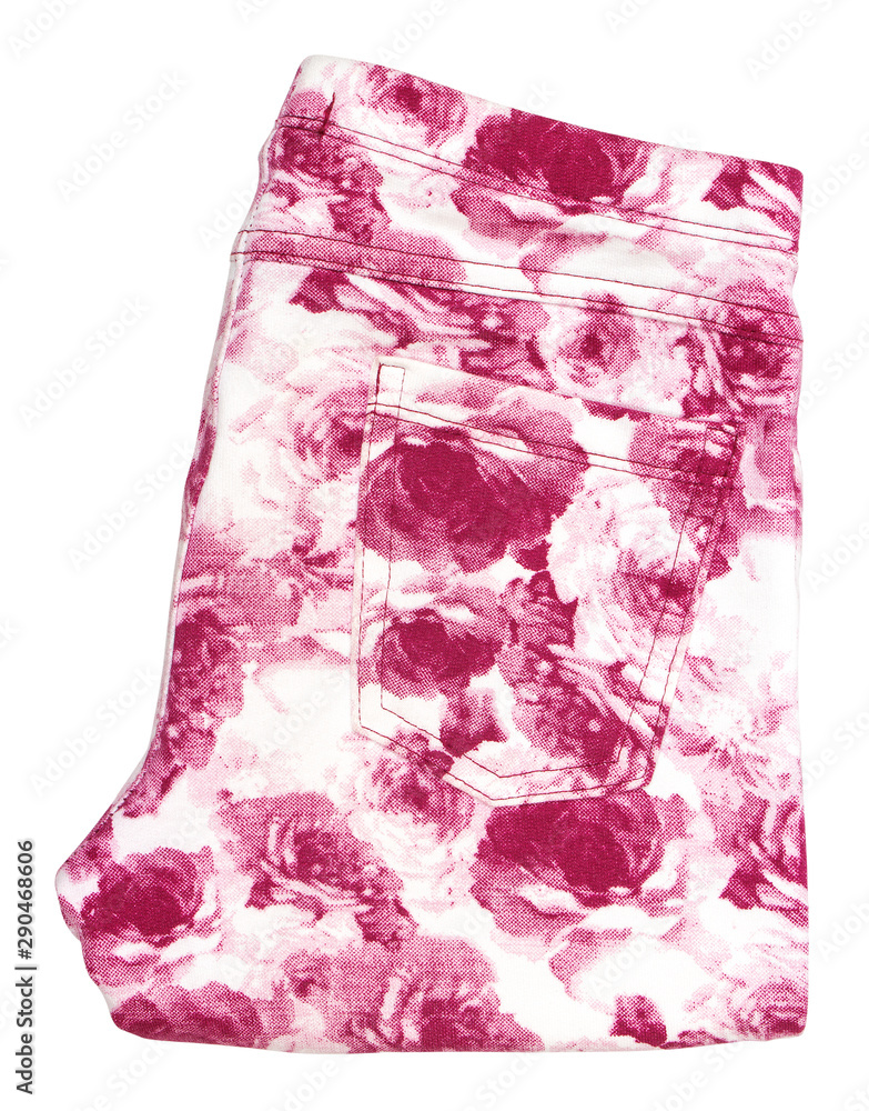 folded pink baby pants in roses on an isolated white background
