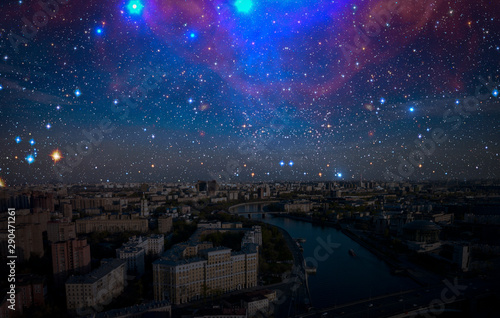 night sky with many stars over urban city landscape