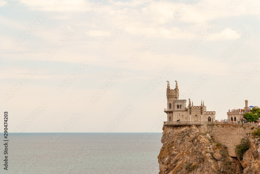 castle, sea, architecture, tower, old, sky, building, fortress, landscape, water, stone, fort, ancient, travel, medieval, landmark, italy, coast, scotland, history, rock, europe, crimea, palace, ocean