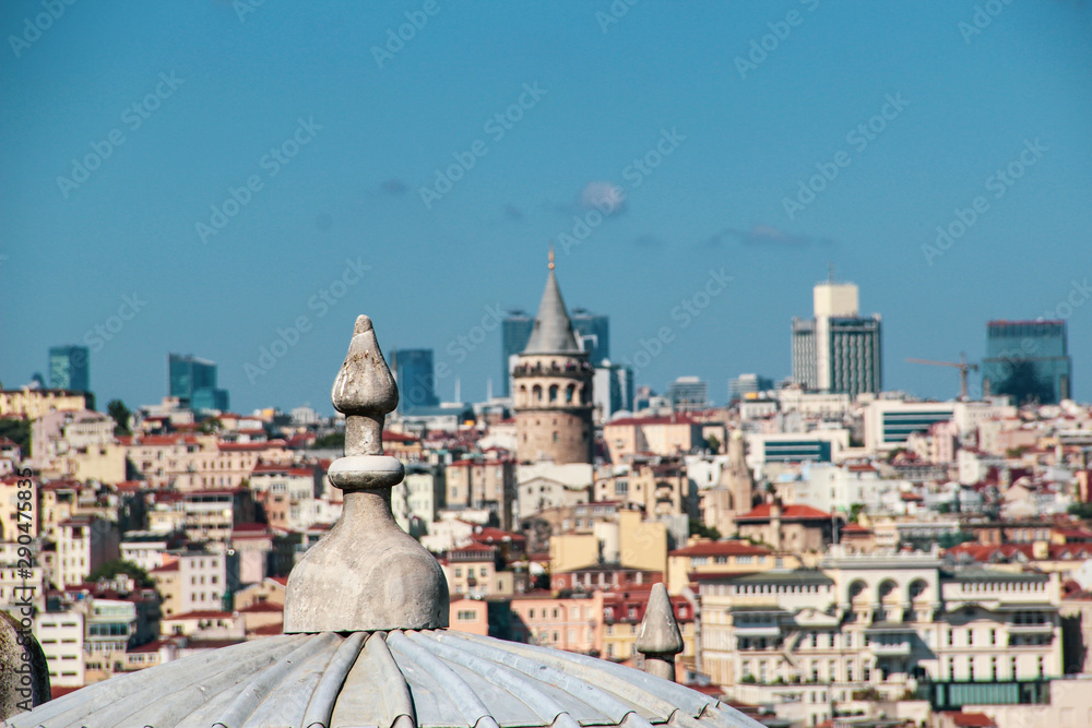 Galata Tower and Mosque dome silhouette with Bosphorus landscape in Golden Horn of Istanbul city in Turkey and the sea of Marmara 