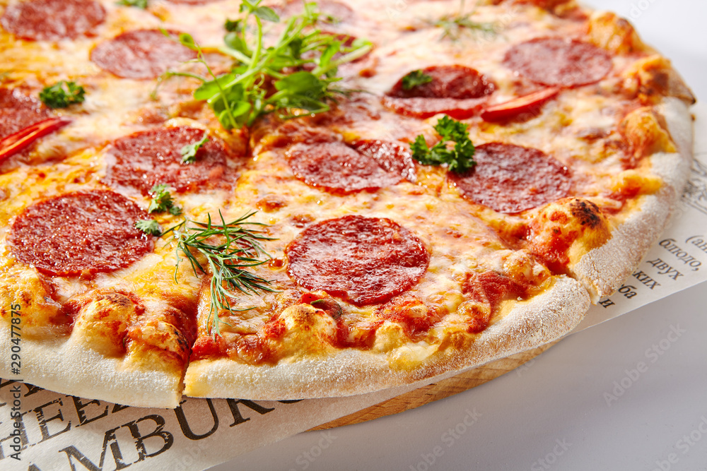 Pepperoni or Salami Pizza with Chili Pepper, Mozzarella and Tomatoes Pepperoni or Salami Pizza with Chili Pepper, Mozzarella and Tomatoes