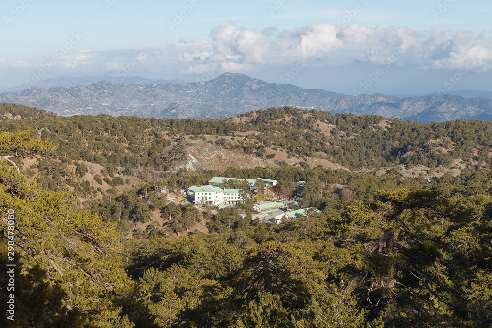 Fototapeta premium Cyprus rocky hills with agriculture, houses and small churches