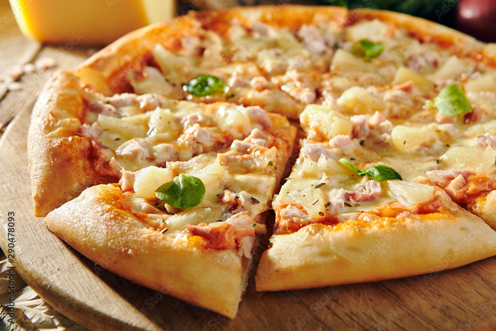 Pizza Restaurant Menu - Delicious Fresh Pizza with Chicken and Pineapple. Pizza on Rustic Wooden Table with Ingredients