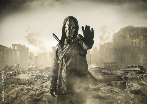 man in gas mask says stop the destruction in the world. , post Apocalypse photo