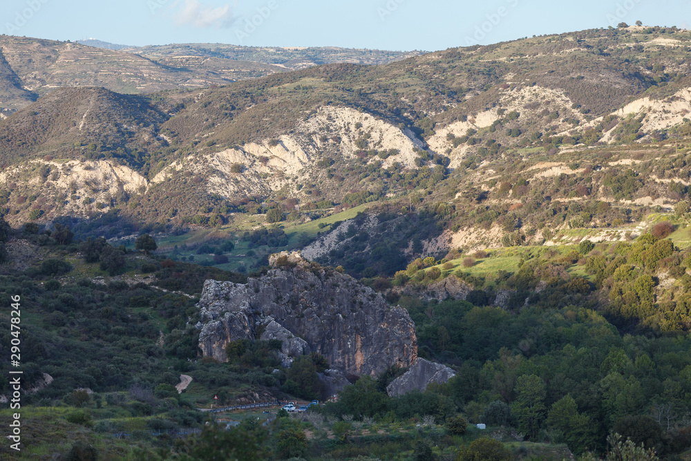 Cyprus rocky hills with agriculture, houses and small churches