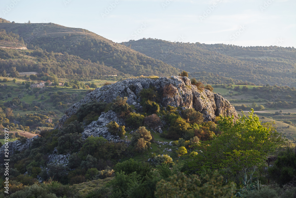 Cyprus rocky hills with agriculture, houses and small churches