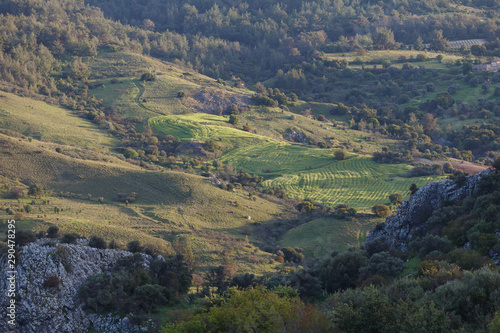 Cyprus rocky hills with agriculture, houses and small churches © yegorov_nick