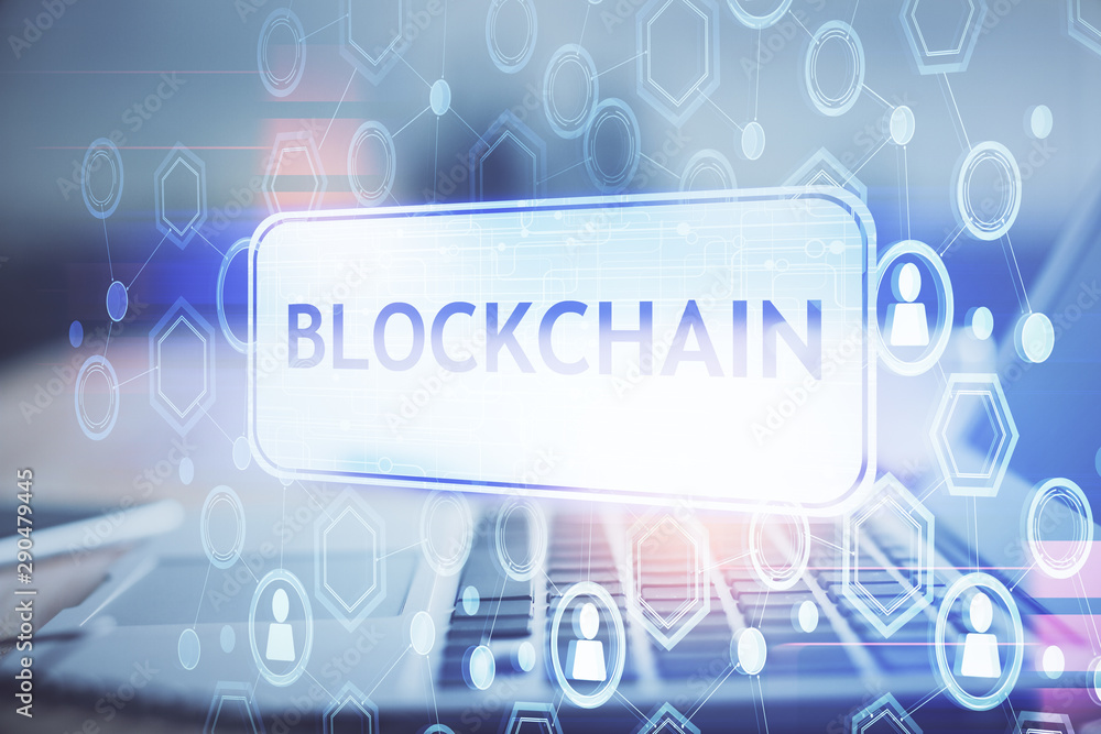 Multi exposure of blockchain theme hologram and table with computer background. Concept of bitcoin crypto currency. Multi exposure of blockchain theme hologram and table with computer background. Concept of bitcoin crypto currency.