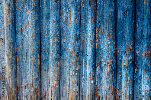 blue peeling wooden background, texture of peeling paint on wood © Владислав Гузенко