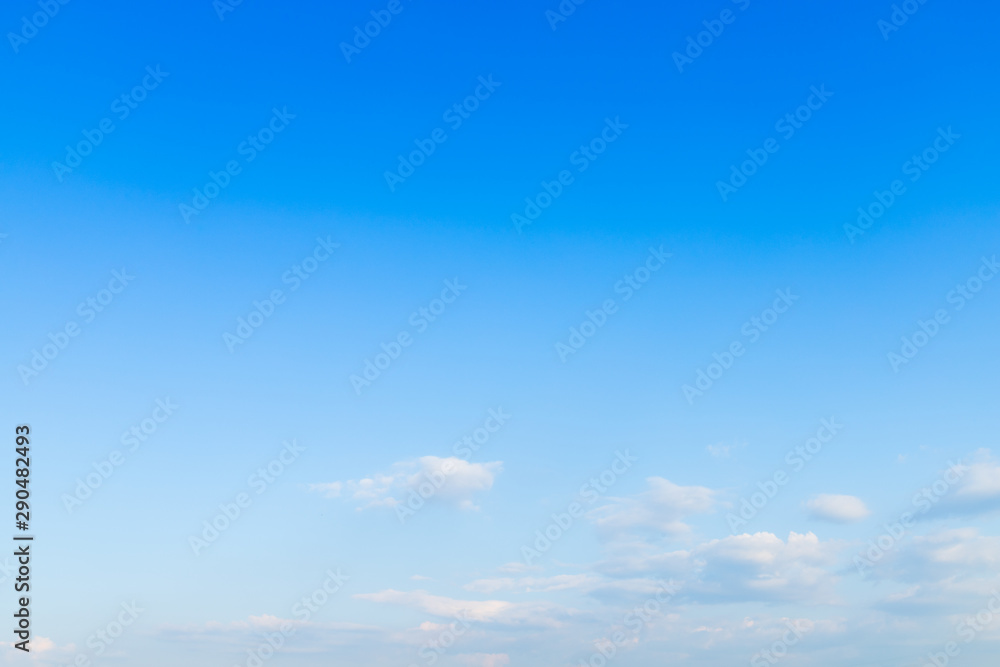 Obraz premium blue sky background texture with white clouds.