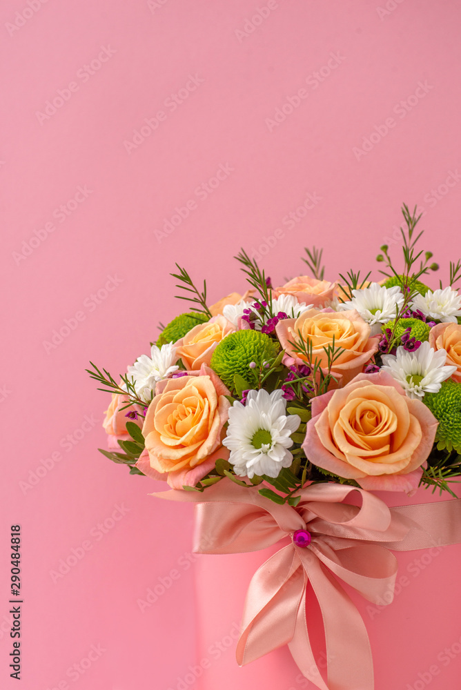 Autocolant Beautiful bouquet in a coral luxury present box with a pink bow, isolated on pin