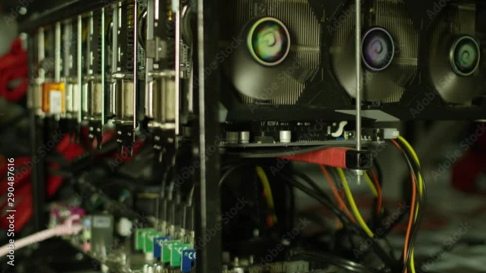 Bitcoin Farm Extreme Close Up of Spinning Fans on Rack Bitcoin Farm Extreme Close Up of Spinning Fans on Rack