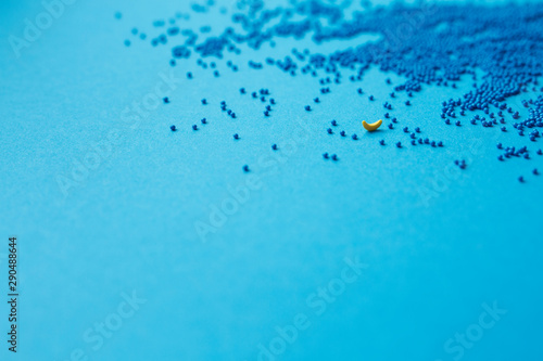  sprinkle of blue balls on a blue background