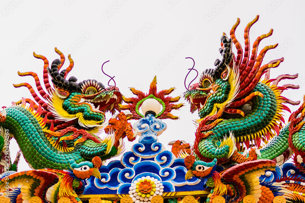 Golden Chinese Dragon at sunset in the twilight background, Dragon statue Chinese style, Chinese style dragon statue concept for background Golden Chinese Dragon at sunset in the twilight background, Dragon statue Chinese style, Chinese style dragon statue concept for background
